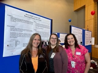 union and management employees presenting their display boards at the SHARE and UMass Memorial UBT Fair in Worcester, Massachusetts.