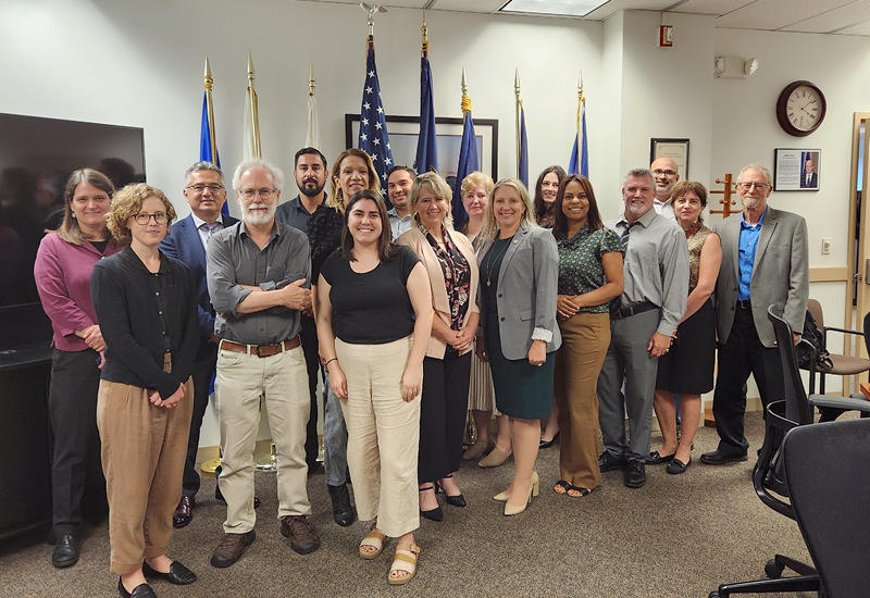 Diego Low (fourth from left) with other worker advocates and Wage and Hour Division staff